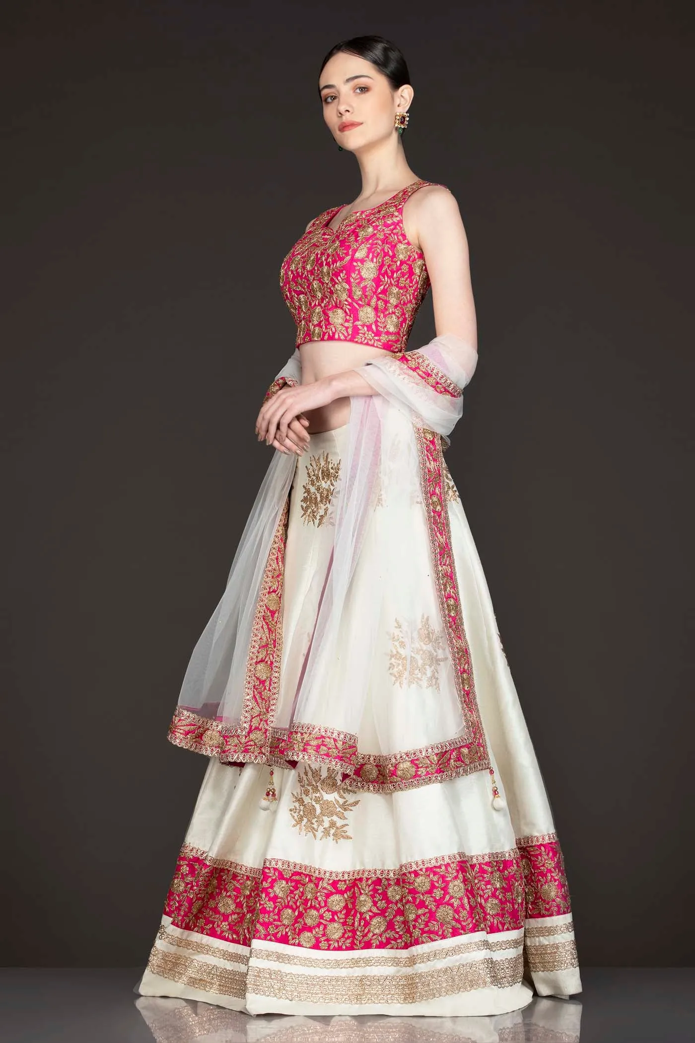 Fuchsia Pink Silk Top With Ivory Silk Lehenga With Net Dupatta