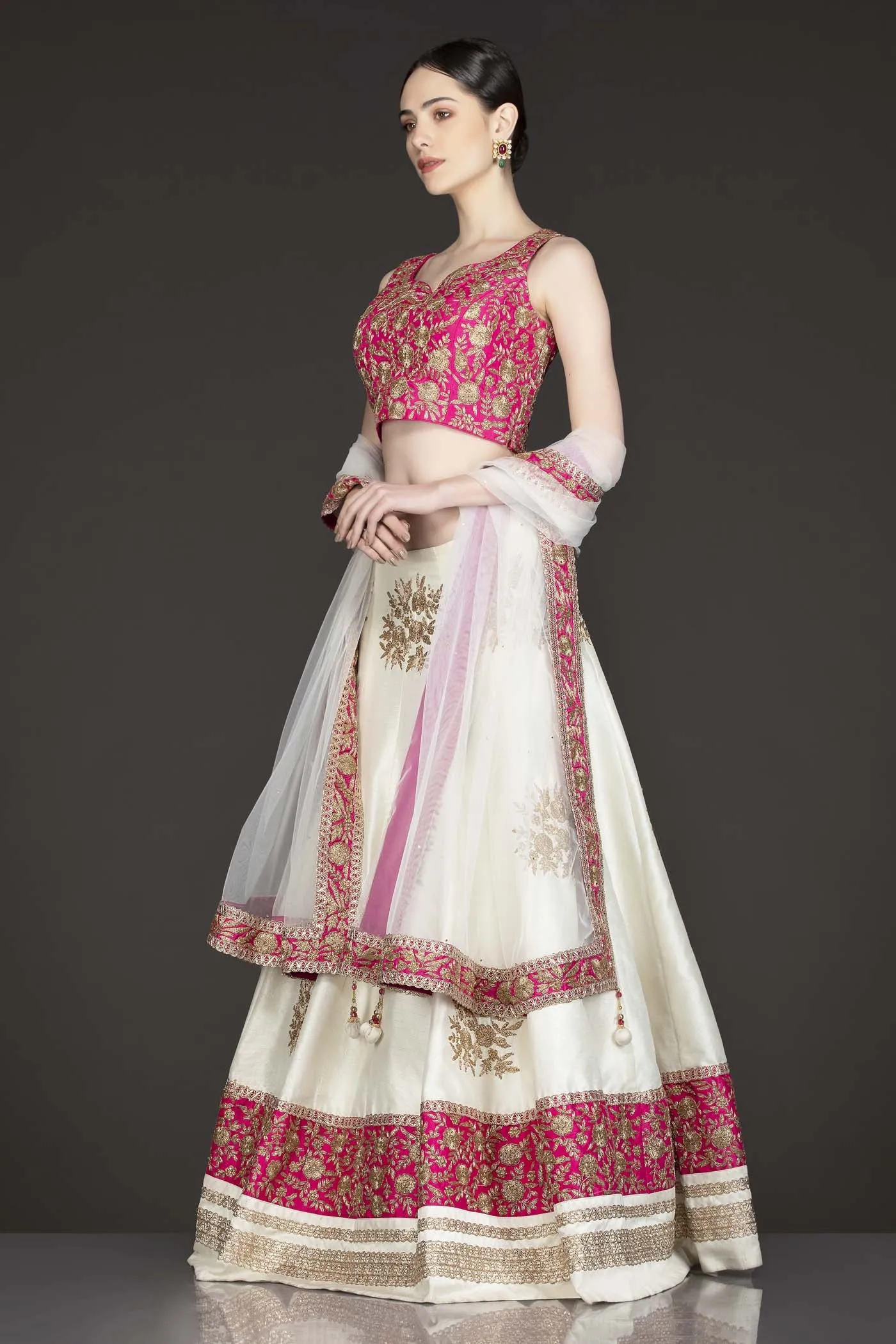 Fuchsia Pink Silk Top With Ivory Silk Lehenga With Net Dupatta