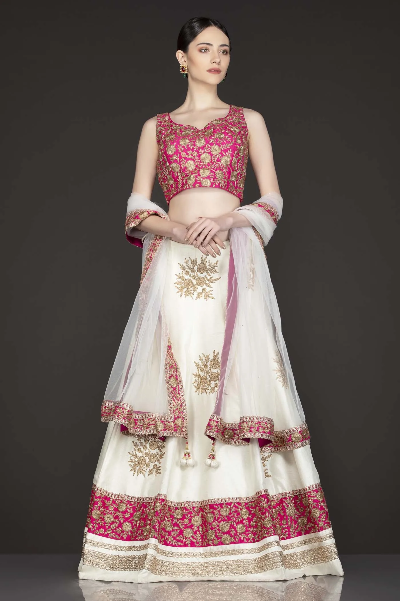 Fuchsia Pink Silk Top With Ivory Silk Lehenga With Net Dupatta